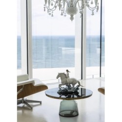 Riding her horse on the seashore Horse Woman Figurine