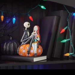 Jim Shore Jack and Sally on a Pumpkin Figurine